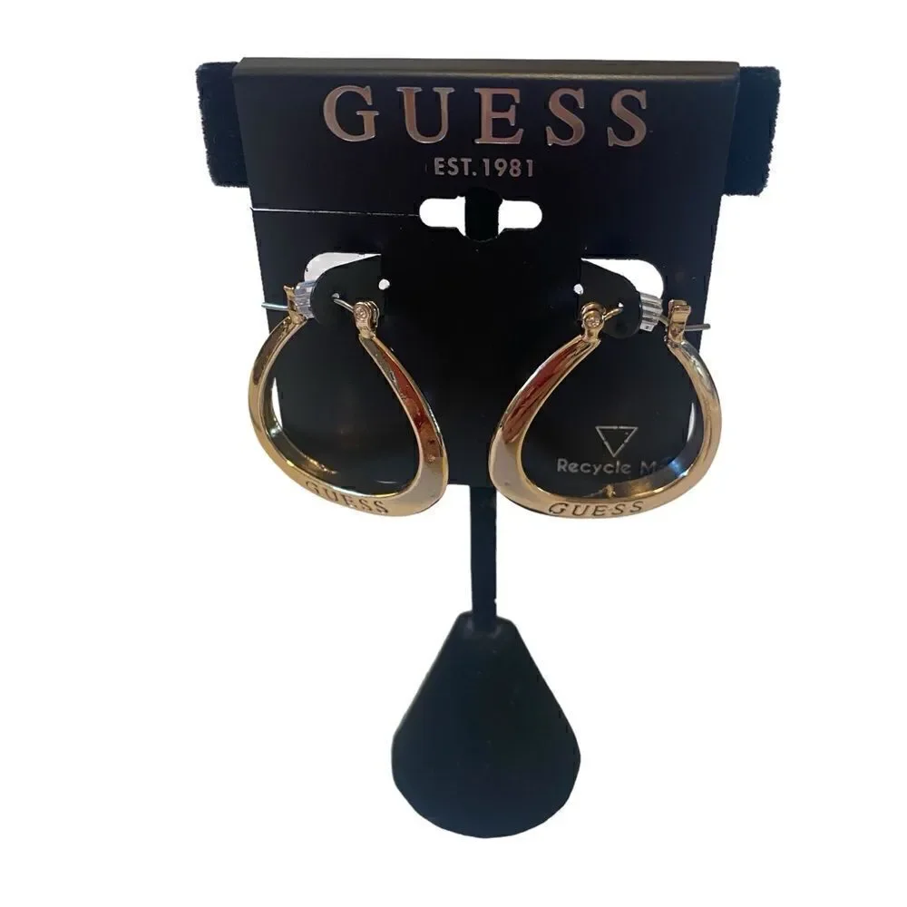 Bright Gold Toned Guess Embossed Earrings.